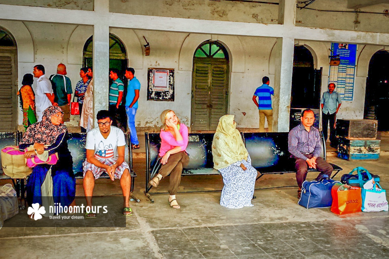 Waiting for the train at a train station in Bangladesh
