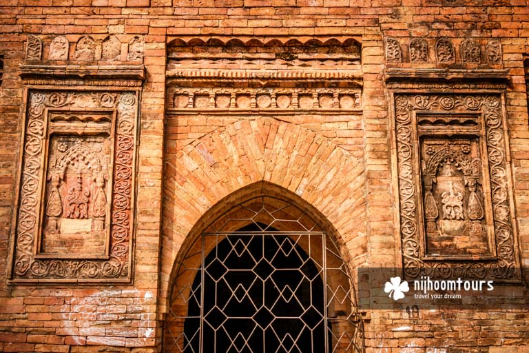 Photo of terracotta ornamentation at the wall of Goaldi Mosque